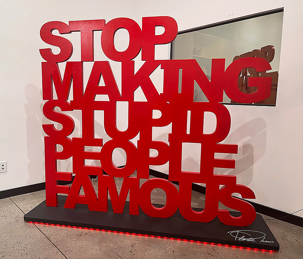 Large Red: Stop Making Stupid People Famous by Plastic Jesus